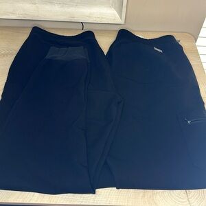 A pair of black Fig jogger pants
